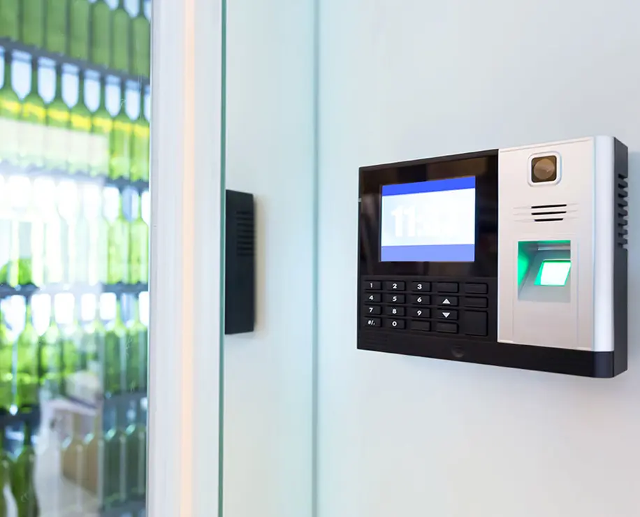 A digital access control panel mounted on a wall