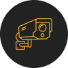 A yellow outline of a security camera on a black circular background.