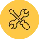 Yellow circle with a wrench and screwdriver crossed in the center.