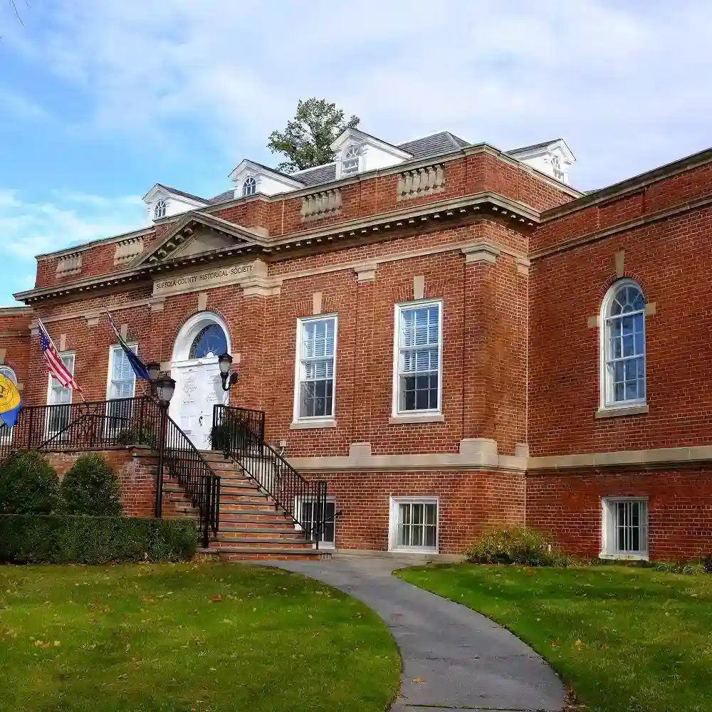 A brick building with white trim